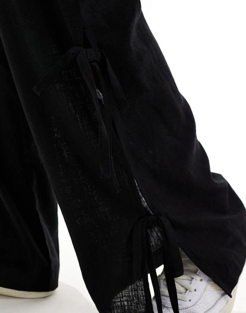 ASOS ASOS DESIGN pull on trouser with tie side with linen in black 3