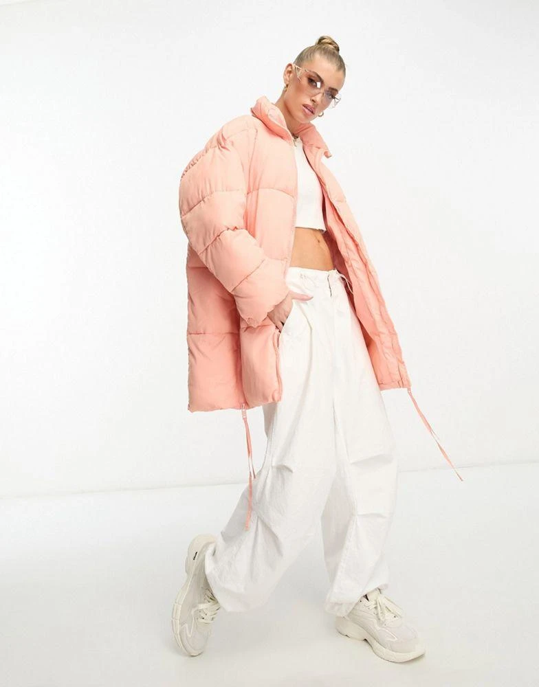 Don't Think Twice DTT Sarah longline puffer jacket in pink 1