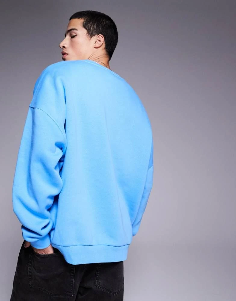NIKE Nike Club oversized sweatshirt in blue 3