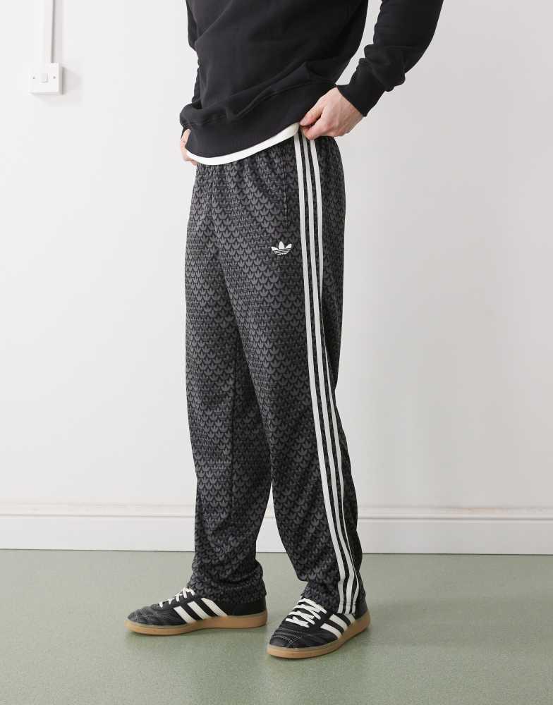 Adidas adidas Originals Firebird loose monogram track pants in