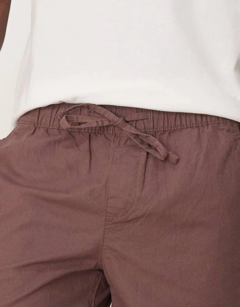 ASOS ASOS DESIGN slim mid length linen blend shorts in brown 3