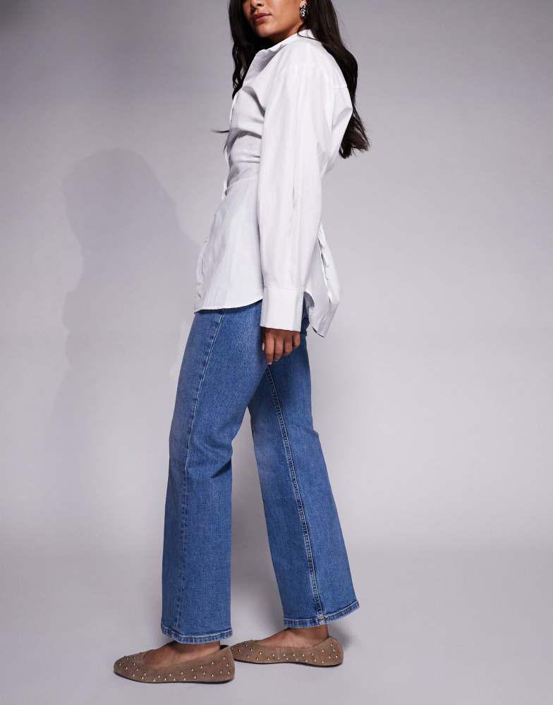 River Island River Island petite high rise pocket detail flare jeans in light denim