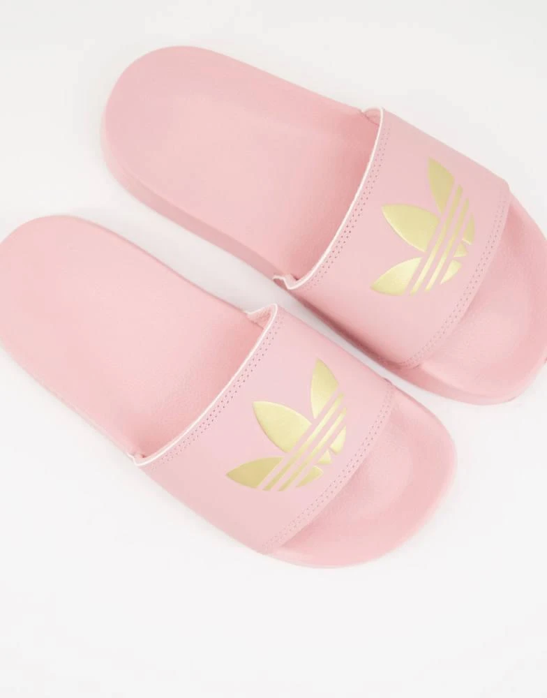 Adidas adidas Originals Adilette lite sliders in pink with gold trefoil 1