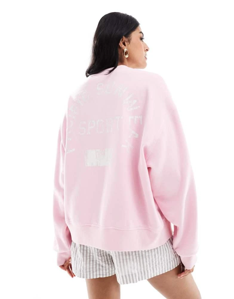 PacSun Pacsun sport slogan crewneck sweater in pink 1