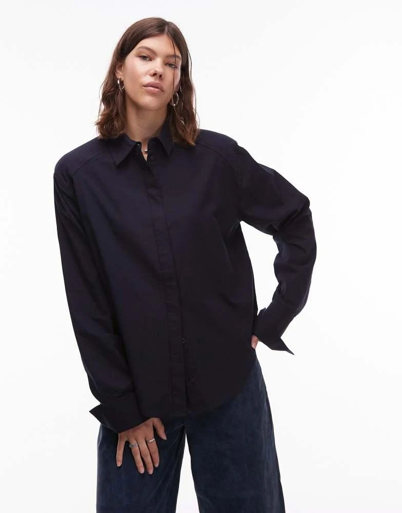 ASOS ASOS DESIGN dipped hem shoulder pad shirt in navy 2