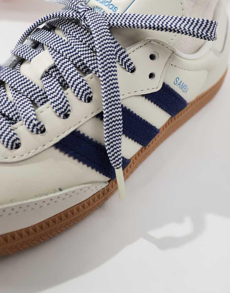 Shop adidas Originals Samba trainers in off white and navy on Sale