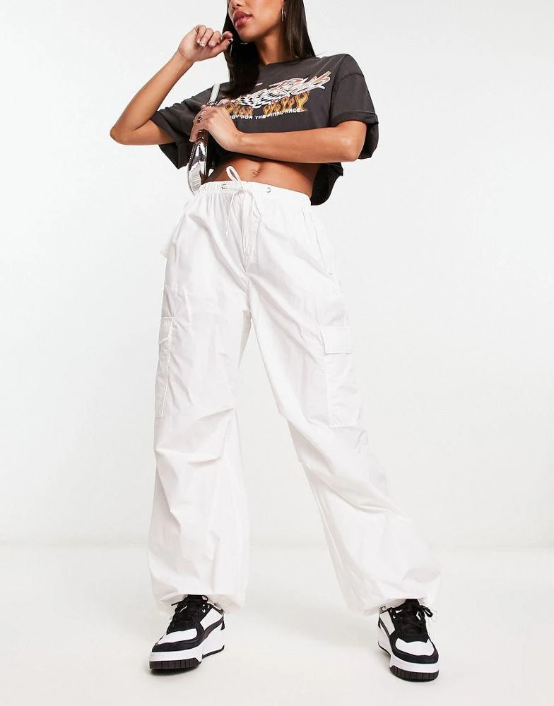 Bershka Bershka tie waist nylon cargo parachute trousers in white 1