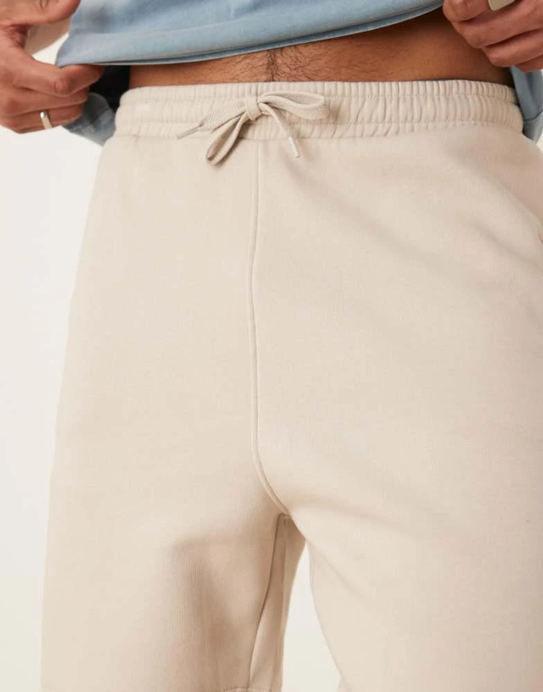 ASOS ASOS DESIGN essential mid length slim shorts in stone 3