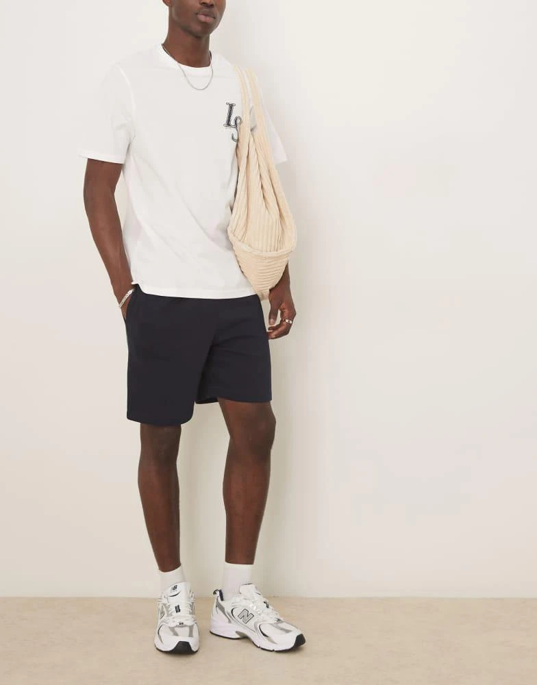 ASOS ASOS DESIGN essential mid length slim shorts in navy 5