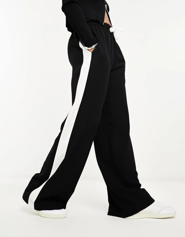 ASOS ASOS DESIGN pull on trousers with contrast panel in black 1