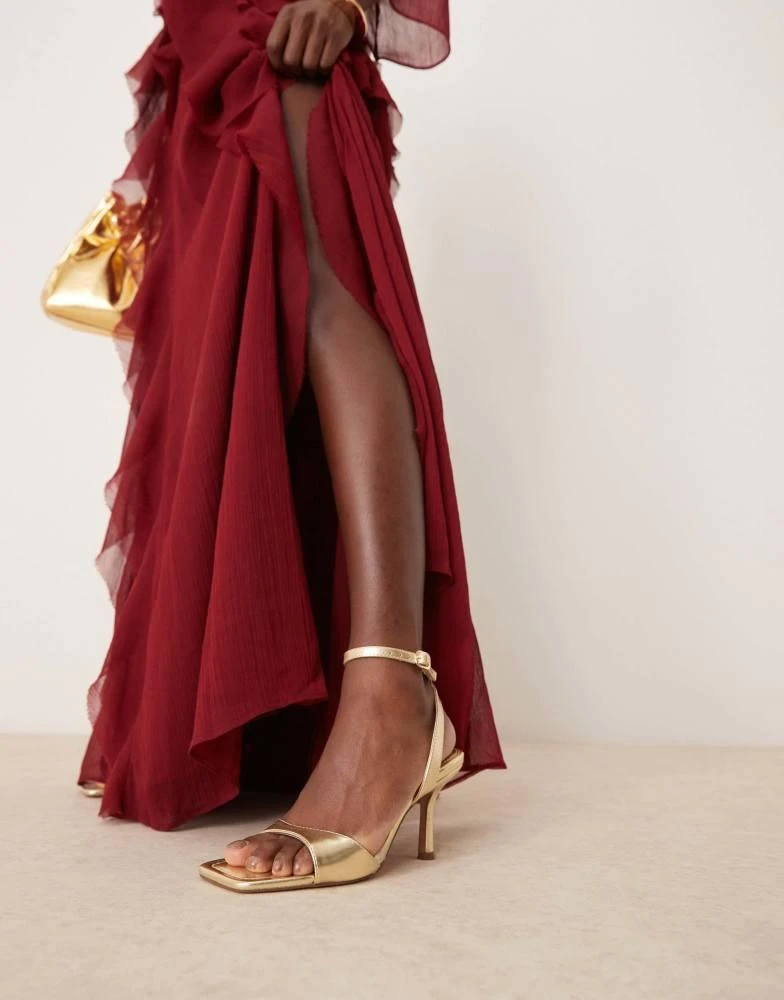 ASOS Design Wide Fit Hollow barely there heeled sandals in gold ASOS Design Wide Fit Hollow barely there heeled sandals in gold