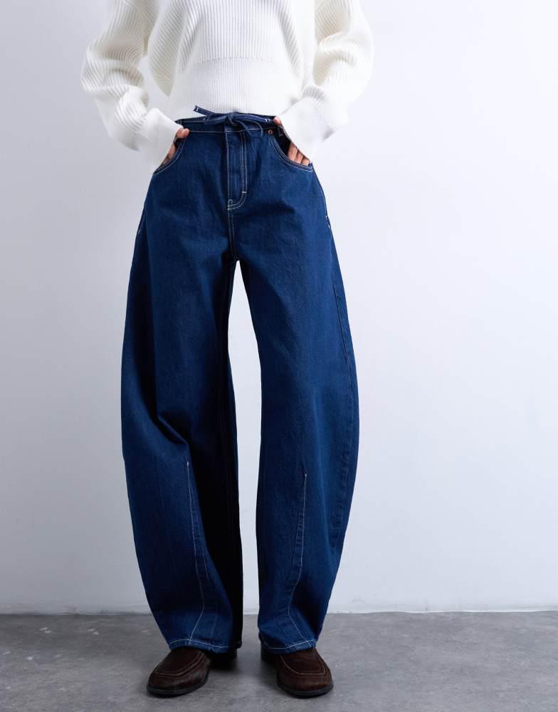Topshop Topshop extreme barrel mid rise jean with belt detail in indigo rinse