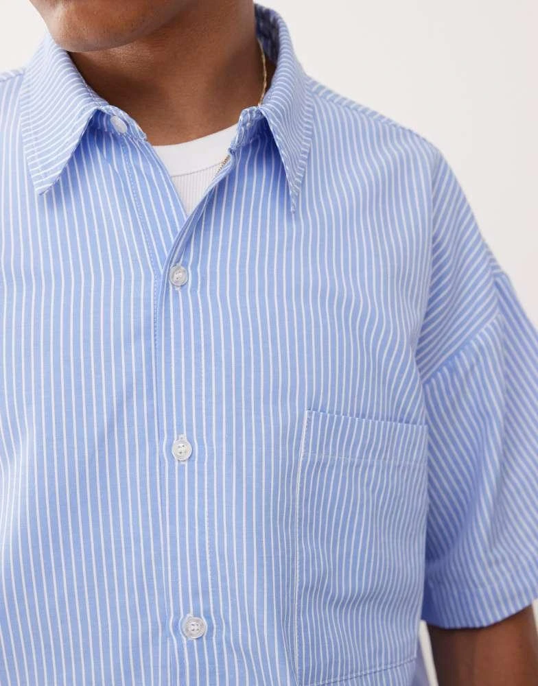 Reclaimed Vintage Reclaimed Vintage short sleeve boxy shirt in blue pinstripe 2