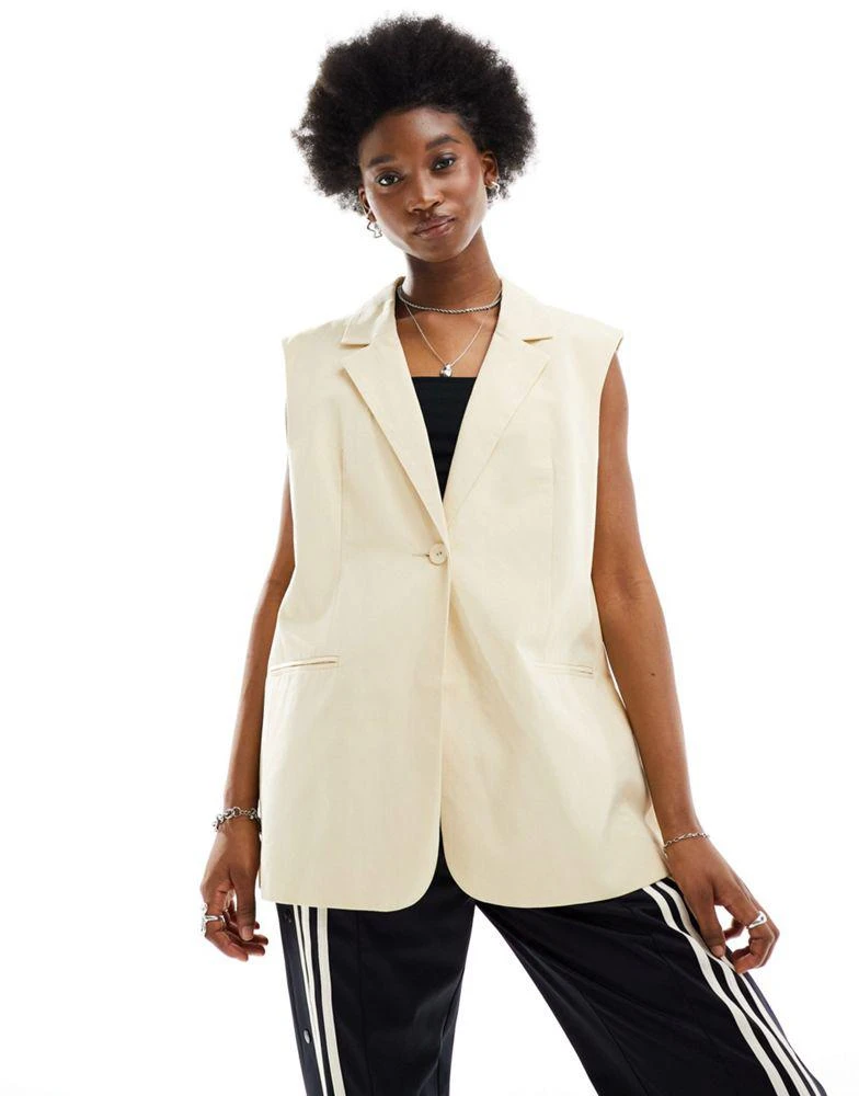 ASOS ASOS DESIGN sleeveless tailored blazer with linen in buttermilk 1