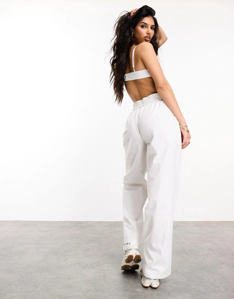 ASOS Weekend Collective Weekend Collective woven trousers with label in white 4