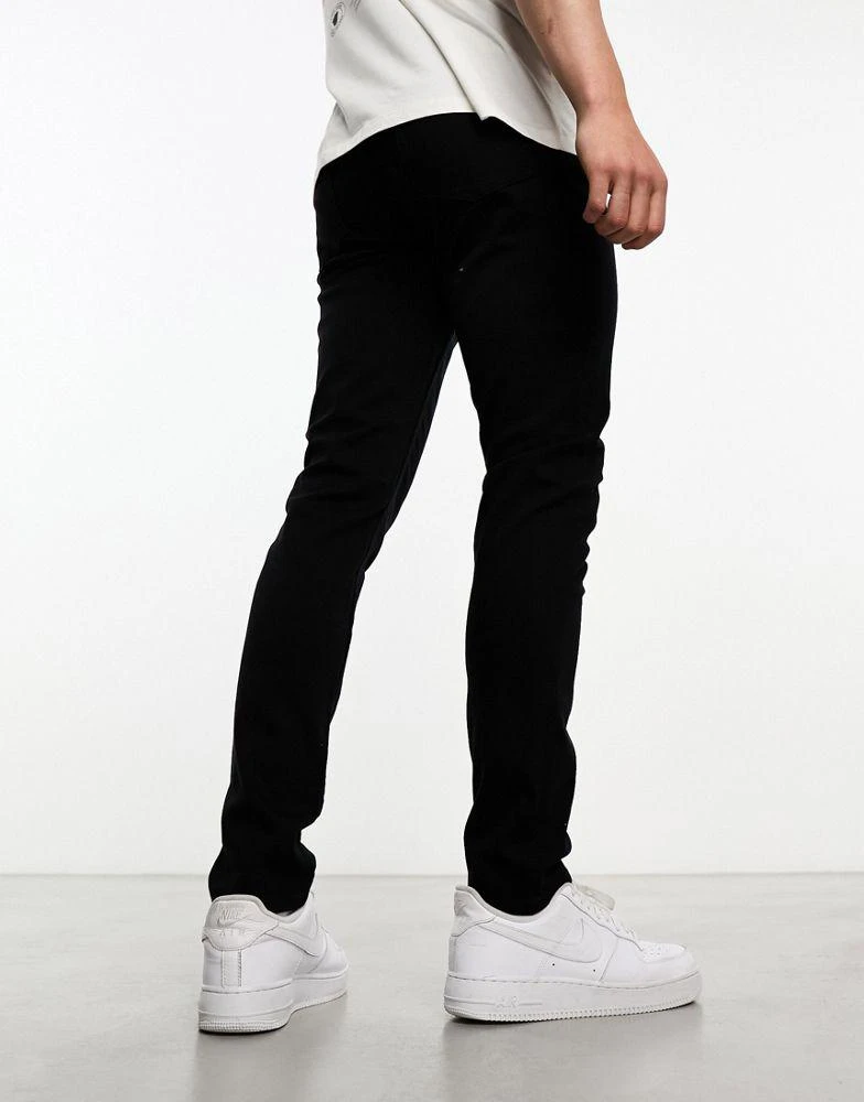 ASOS ASOS DESIGN skinny jeans in no fade black 2