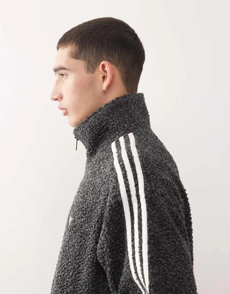 Adidas adidas Originals Boucle Firebird track top in black 4