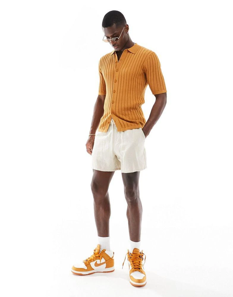ASOS ASOS DESIGN lightweight knitted rib button through polo in burnt orange 3