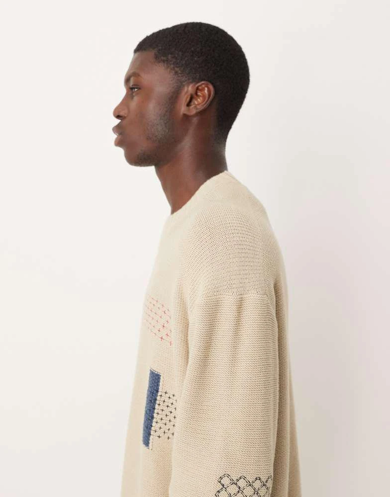 Abercrombie 
Fitch Abercrombie 
Fitch crew neck patch graphic jumper in cream 5