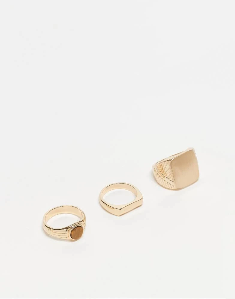 ASOS ASOS DESIGN 3 pack semi-precious tigers eye stone signet ring set in gold 1