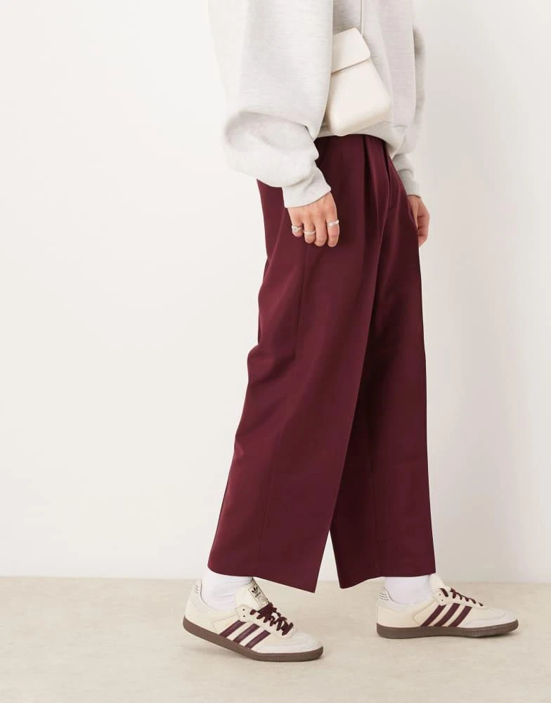 ASOS ASOS DESIGN smart balloon trousers with front pleat in burgundy 1