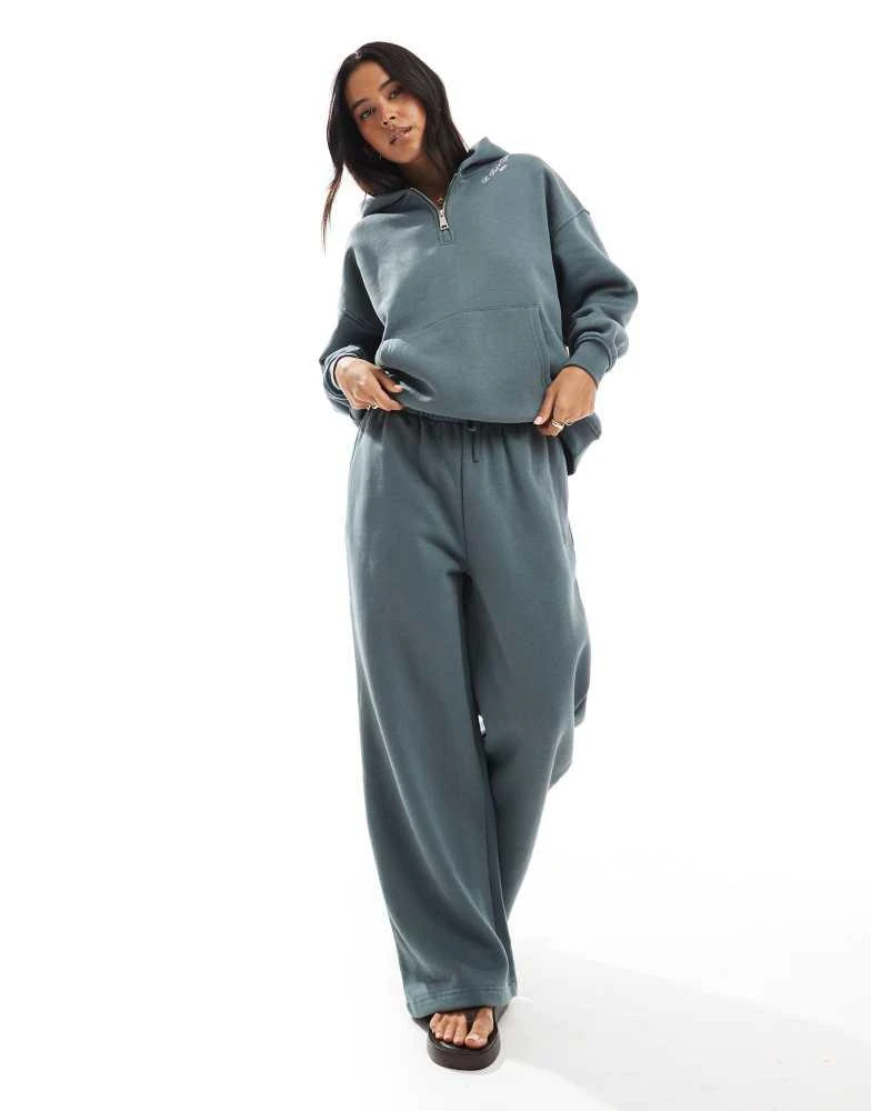 HERA Hera Womens kindness club hoodie in washed sage 3