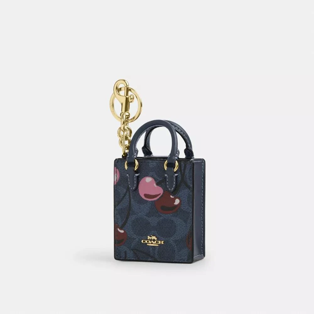 Coach Mini Court Backpack Bag Charm In Signature Canvas With Cherry Print 1