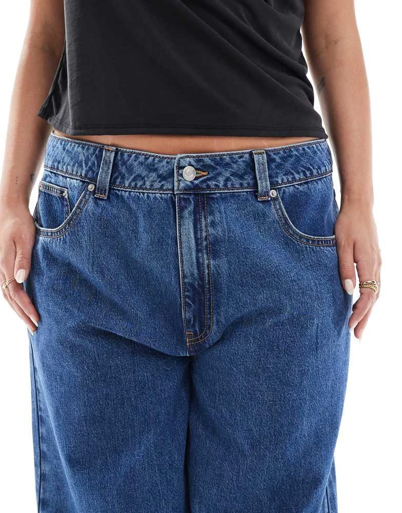 ASOS ASOS DESIGN Curve high waist wide leg jeans in midwash blue 4