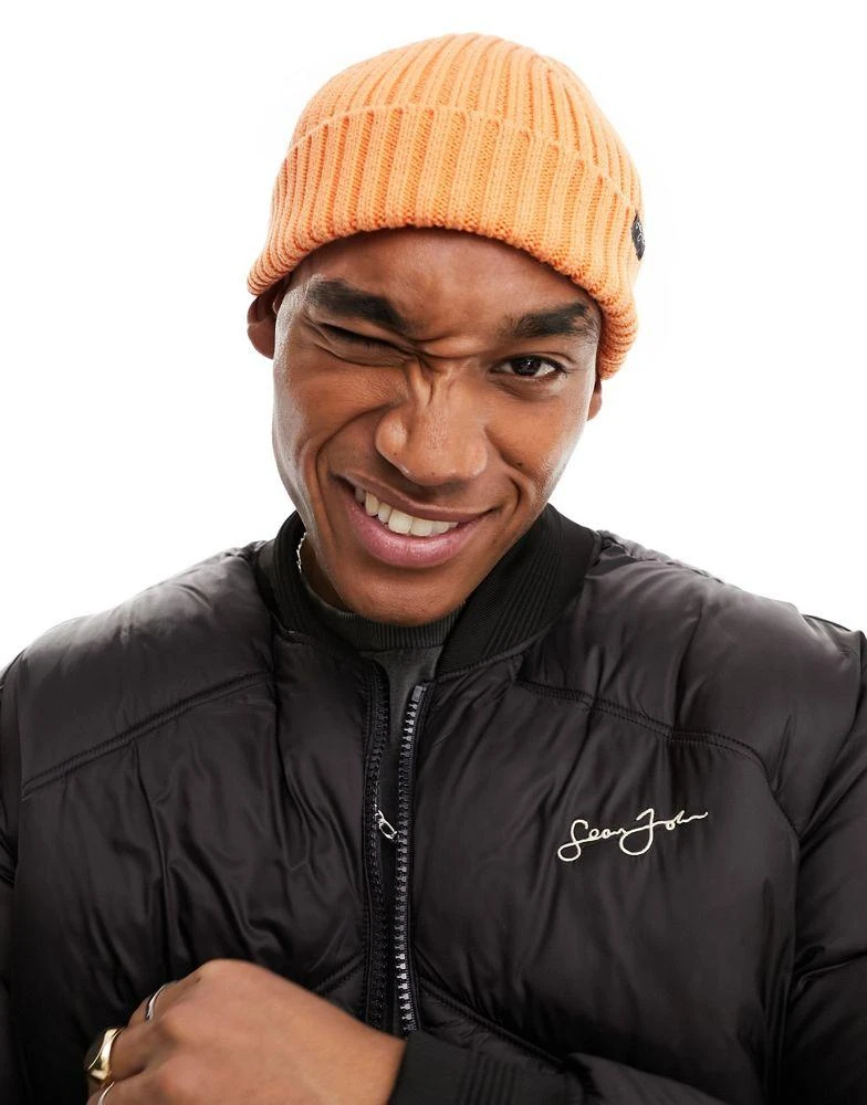 Sean John Sean John script flag beanie in orange 4