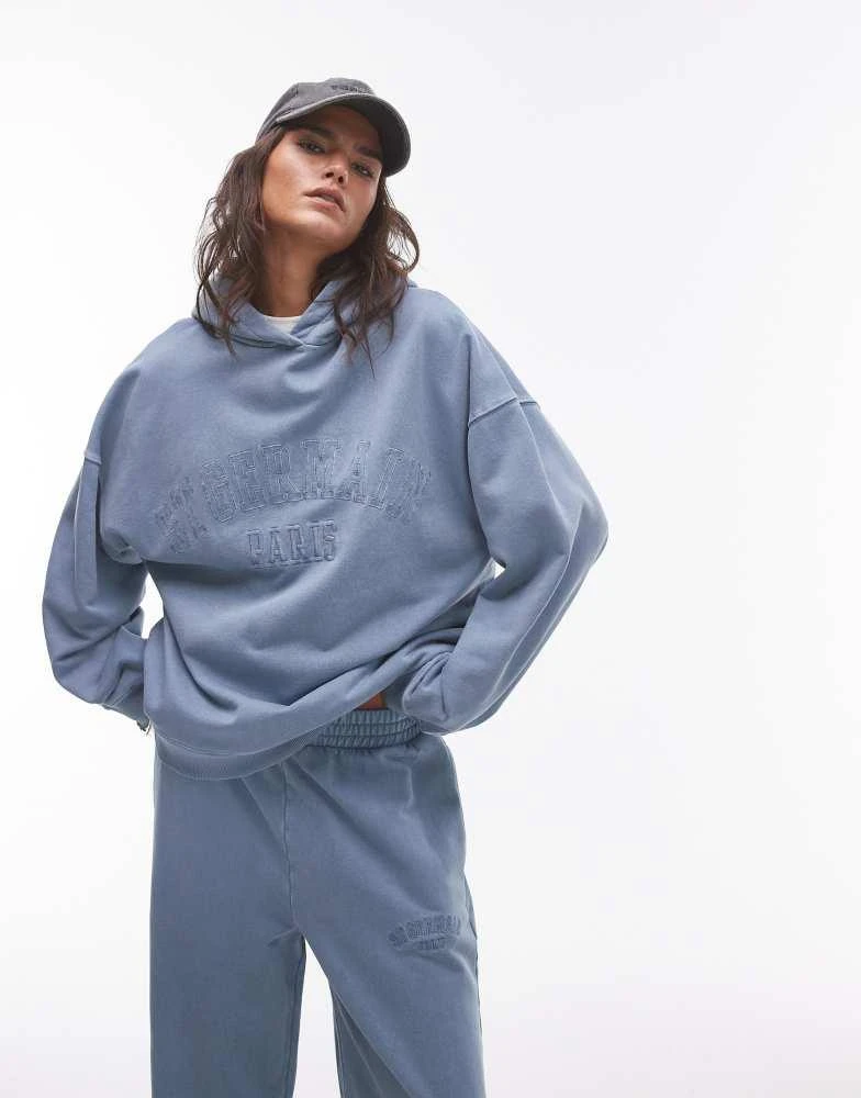 Topshop Topshop co-ord graphic St Germain oversized hoodie in blue 1