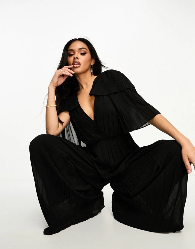 Forever Unique Forever Unique flutter sleeve jumpsuit in black 1