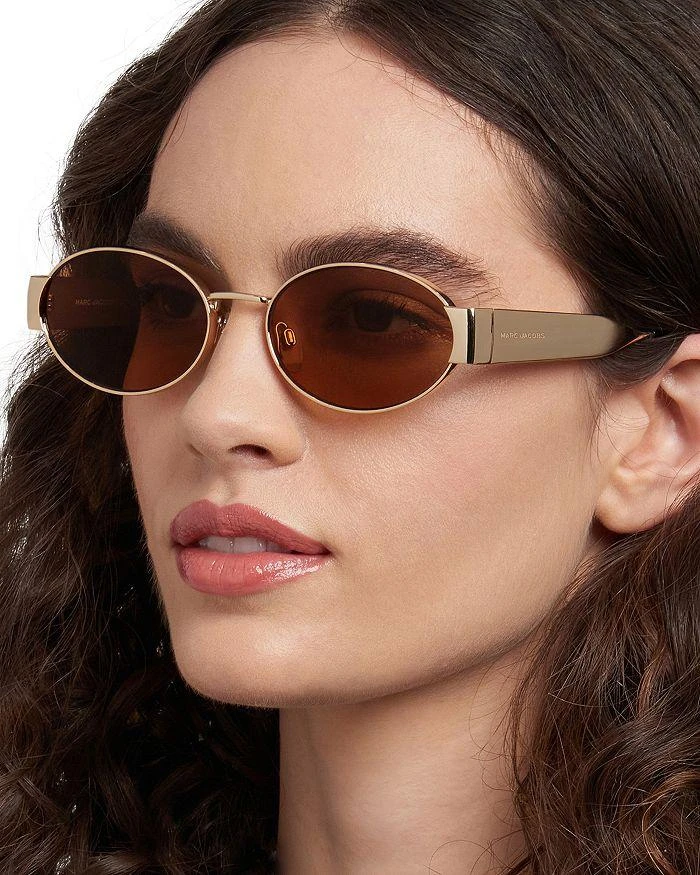 Marc Jacobs Gold Metal Oval Sunglasses with Brown Lenses Marc Jacobs oval sunglasses in gold brown | ASOS main image 3