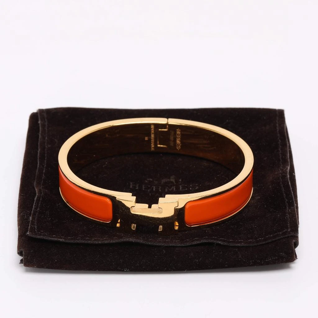 Shop Hermes Clic H Orange Enamel Gold Plated Narrow Bracelet  display picture 2