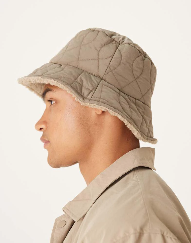ASOS ASOS DESIGN padded and borg reversible bucket hat in neutral 2
