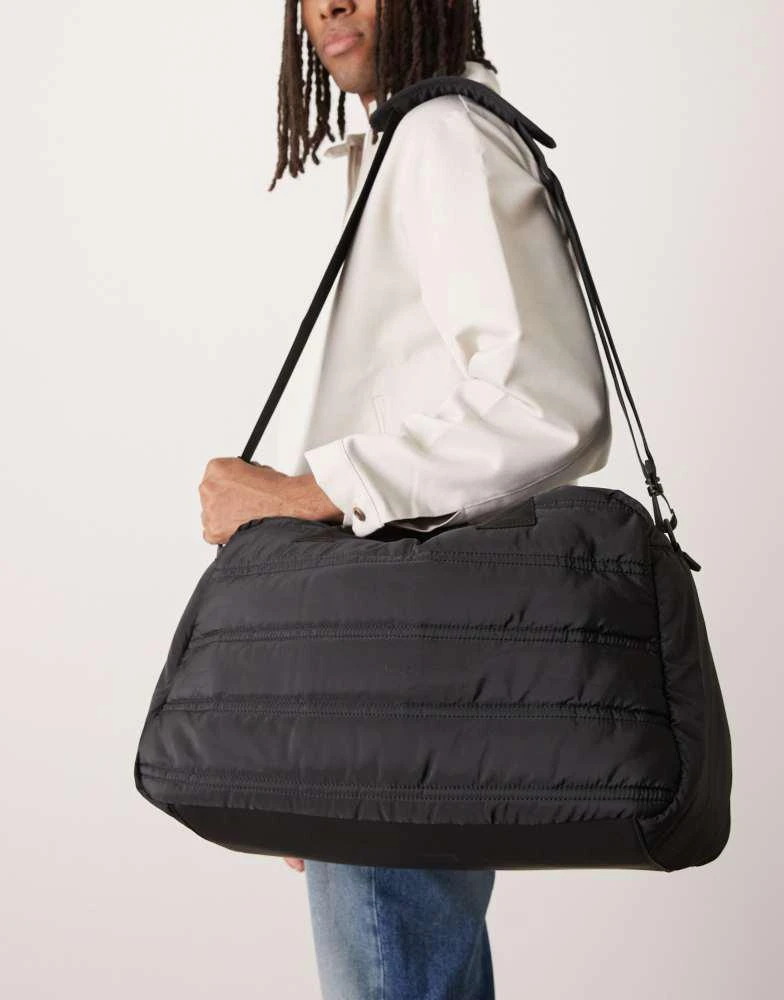 ASOS ASOS DESIGN puffer holdall bag in black 1