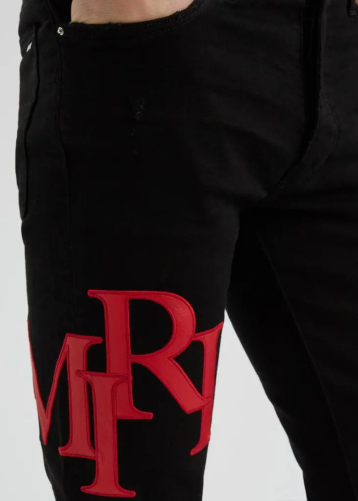 AMIRI Staggered logo skinny jeans  5