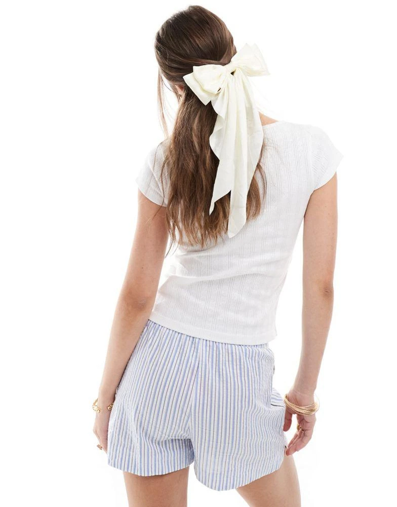ASOS ASOS DESIGN pointelle baby tee with bow lace detail 4