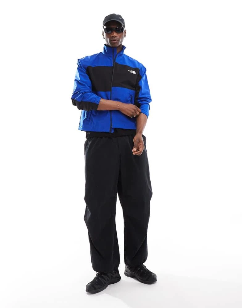 The North Face The North Face Easy Wind zip colourblock jacket in blue 4