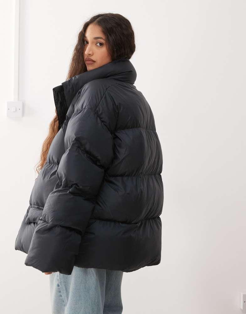 Shop Columbia Puffect Surplus oversized puffer coat in black