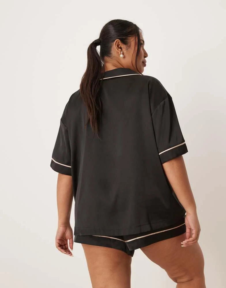 ASOS ASOS DESIGN Curve oversized satin short sleeve shirt and short pyjama set in black 4