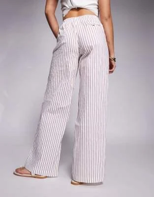 The Couture Club The Couture Club wide leg double layer stripe trouser in beige and burgundy 2
