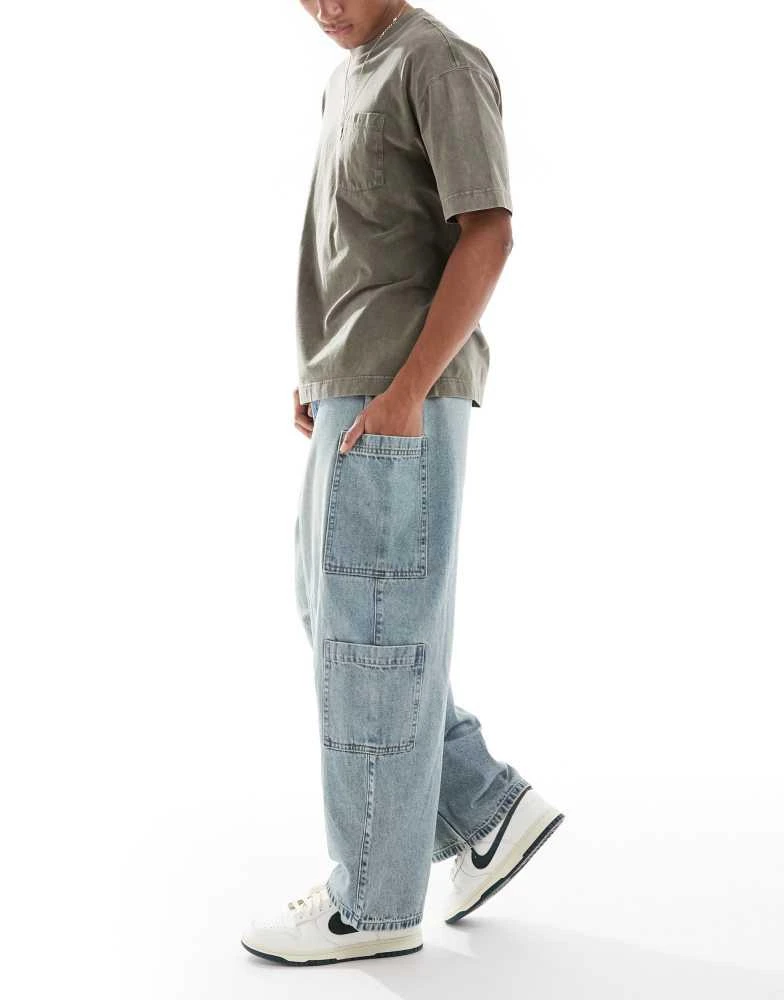 ASOS ASOS DESIGN oversized baggy jeans in bleach wash with tint and cargo pockets 3