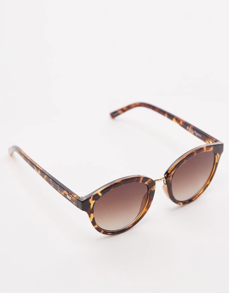 Shop Le Specs influx round sunglasses with gold detail in  display picture 3