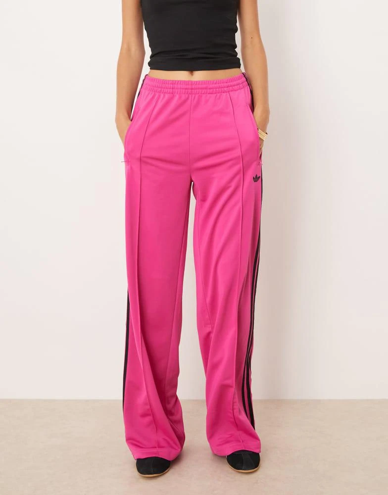 Adidas adidas Originals Adicolor classic firebird loose track pants in fuchsia and black 4