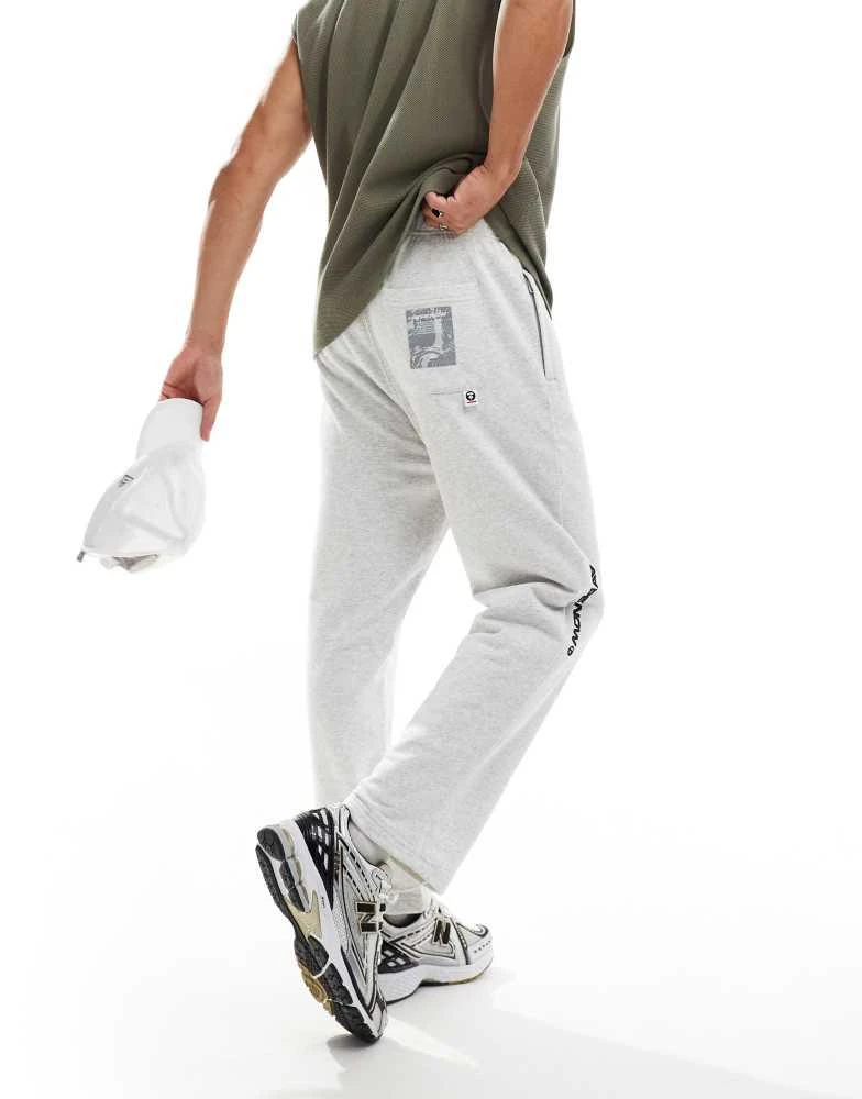 AAPE Aape By A Bathing Ape logo tapered joggers in grey marl 4