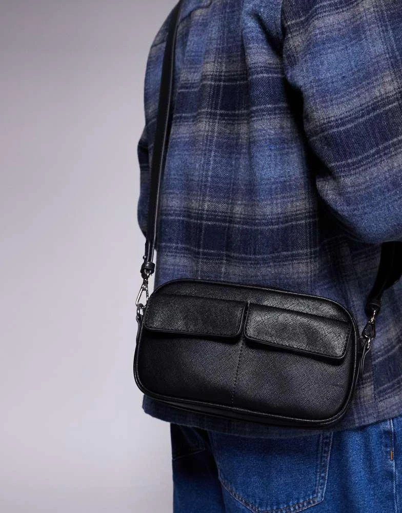 ASOS ASOS DESIGN faux leather cross body bag with pockets in black