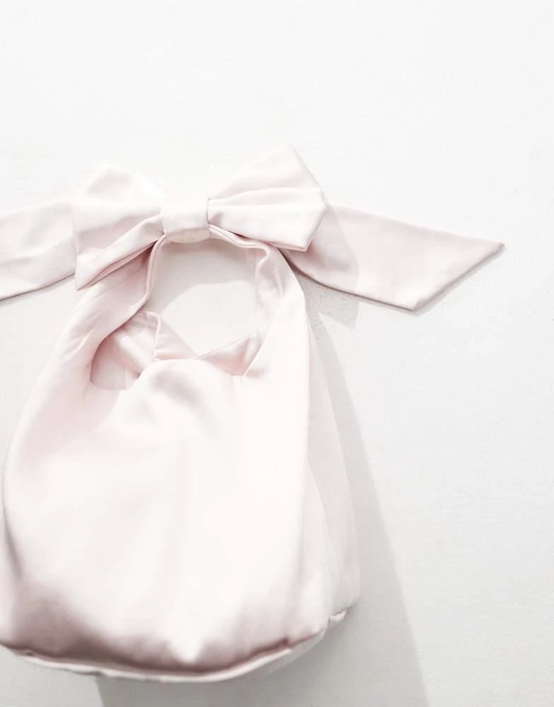 Six Stories Six Stories Bridesmaid satin bow pouch bag in powder pink 2