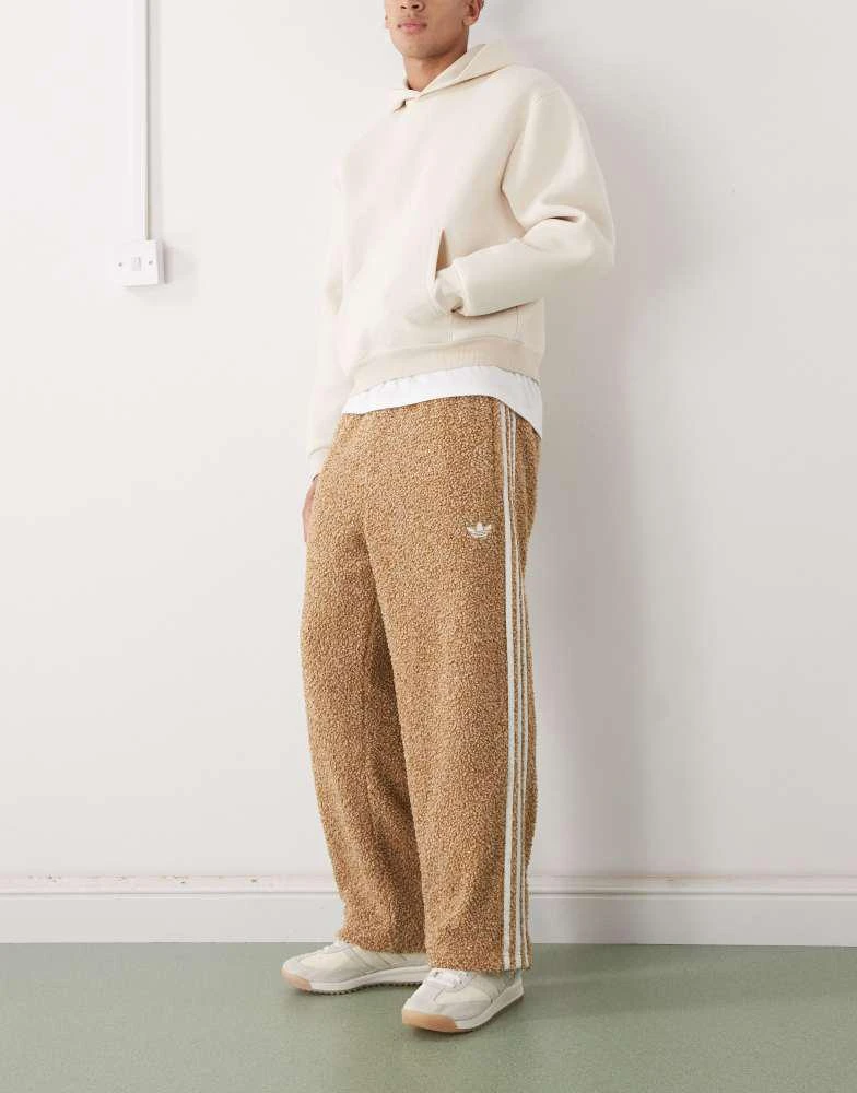 Adidas adidas Originals Boucle Firebird track pants in brown 1