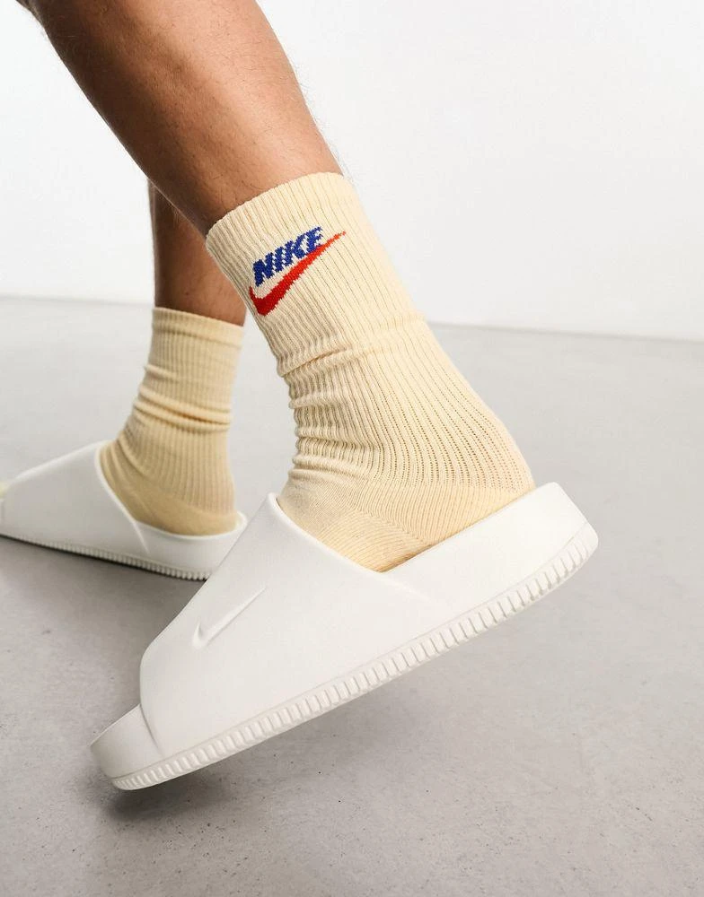 NIKE Nike Calm sliders in white 4