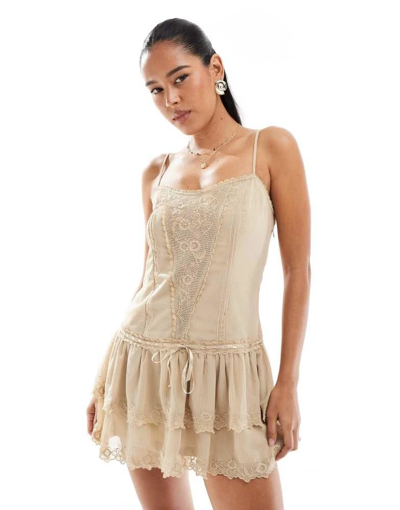Shop Stradivarius lace detail mini cami dress in beige on Sale at  BeyondStyle – Get 11% Off Stradivarius lace detail mini cami dress in beige  with Limited-Time Flash Deals, Exclusive Discounts, and